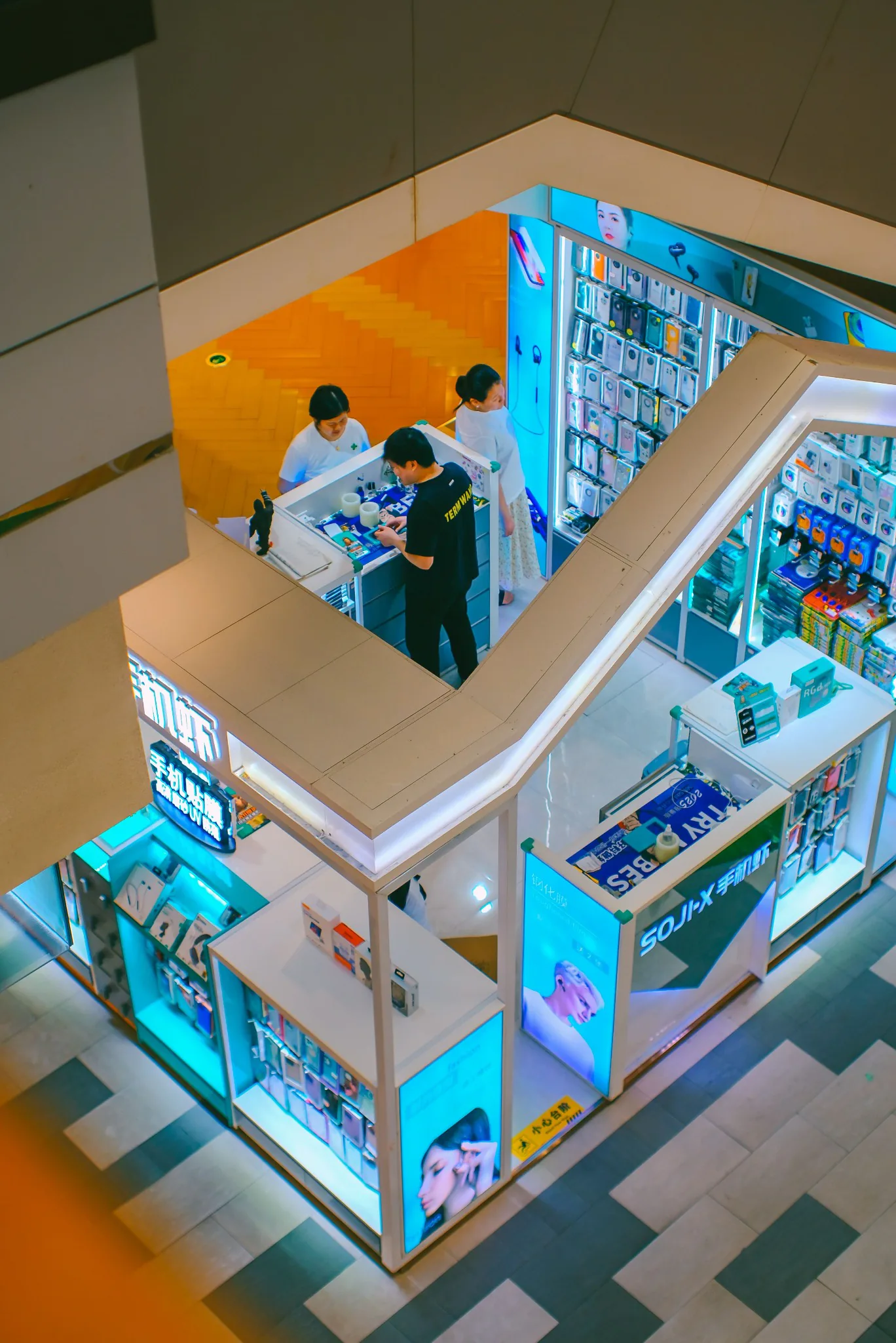 Exhibition display zone with illuminated product presentation counters.